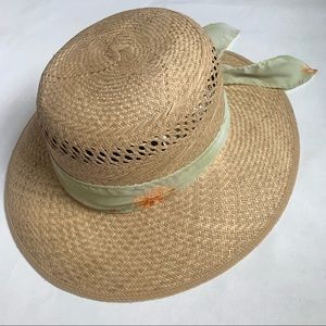Beautifully made straw hat with floral tie
